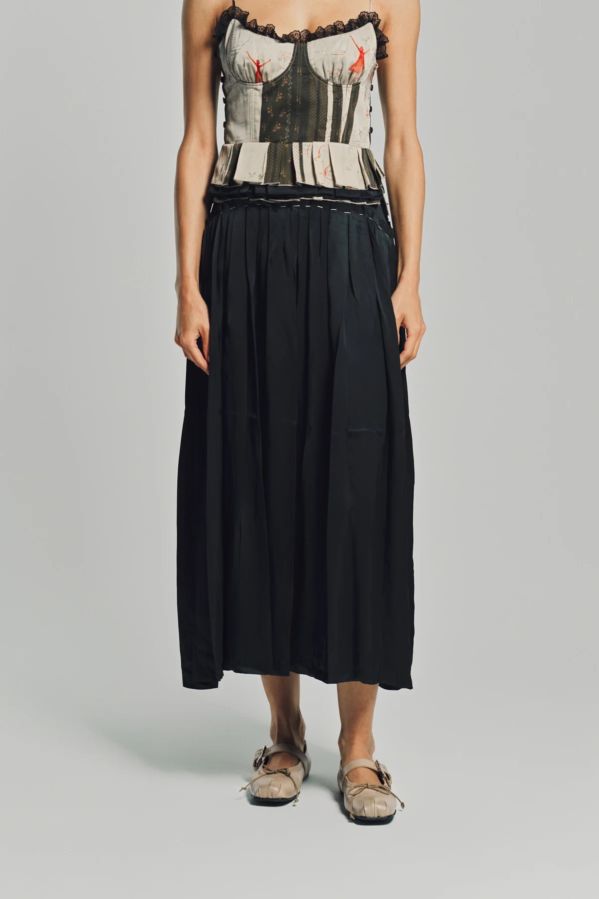 MERUERT TOLEGEN | LIQUID BASTED PLEATED SKIRT - Image 2