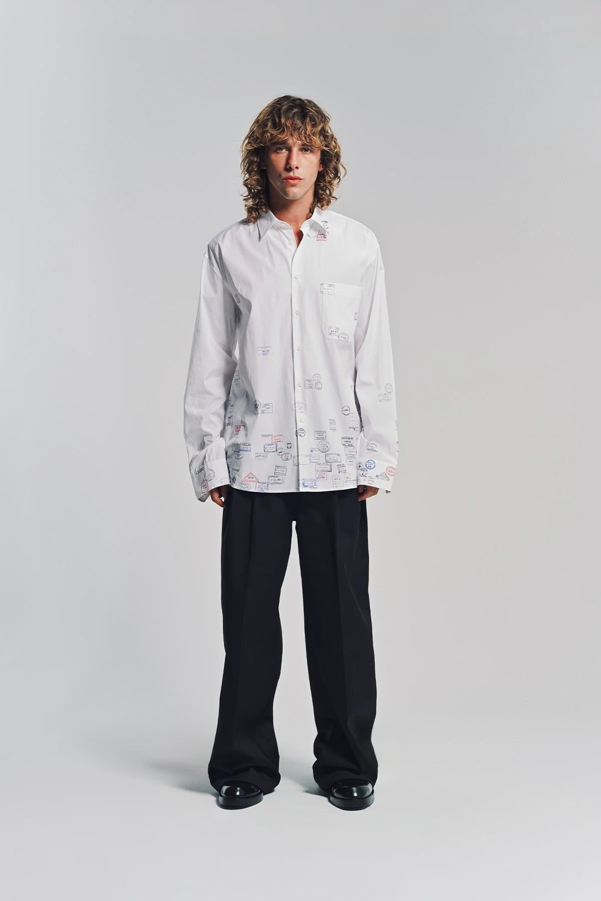 VETEMENTS | PASSPORT STAMPS LONG SLEEVE SHIRT